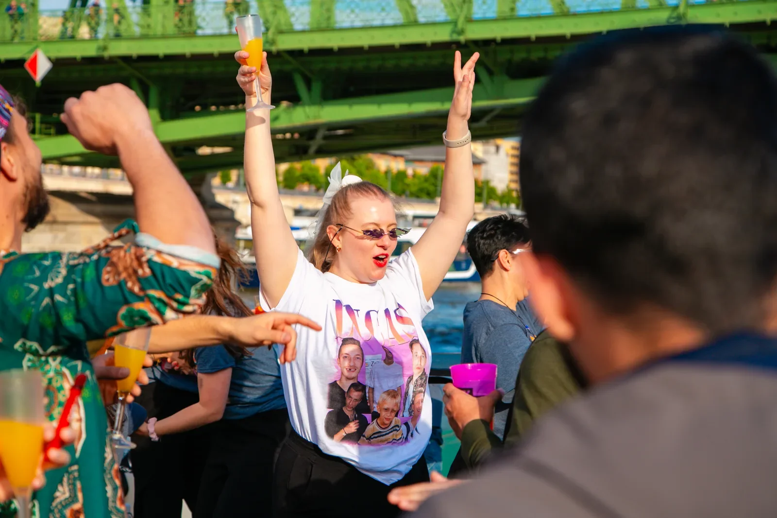 Guests dancing on the deck of a Budapest party boat