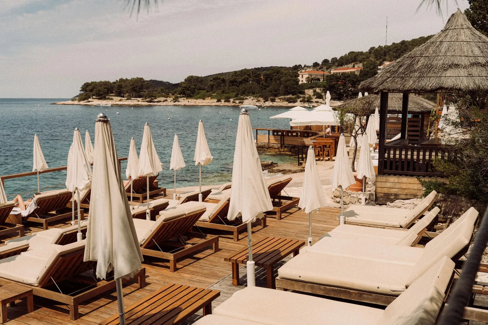 Hula Hula terrace and sun loungers beside the sea