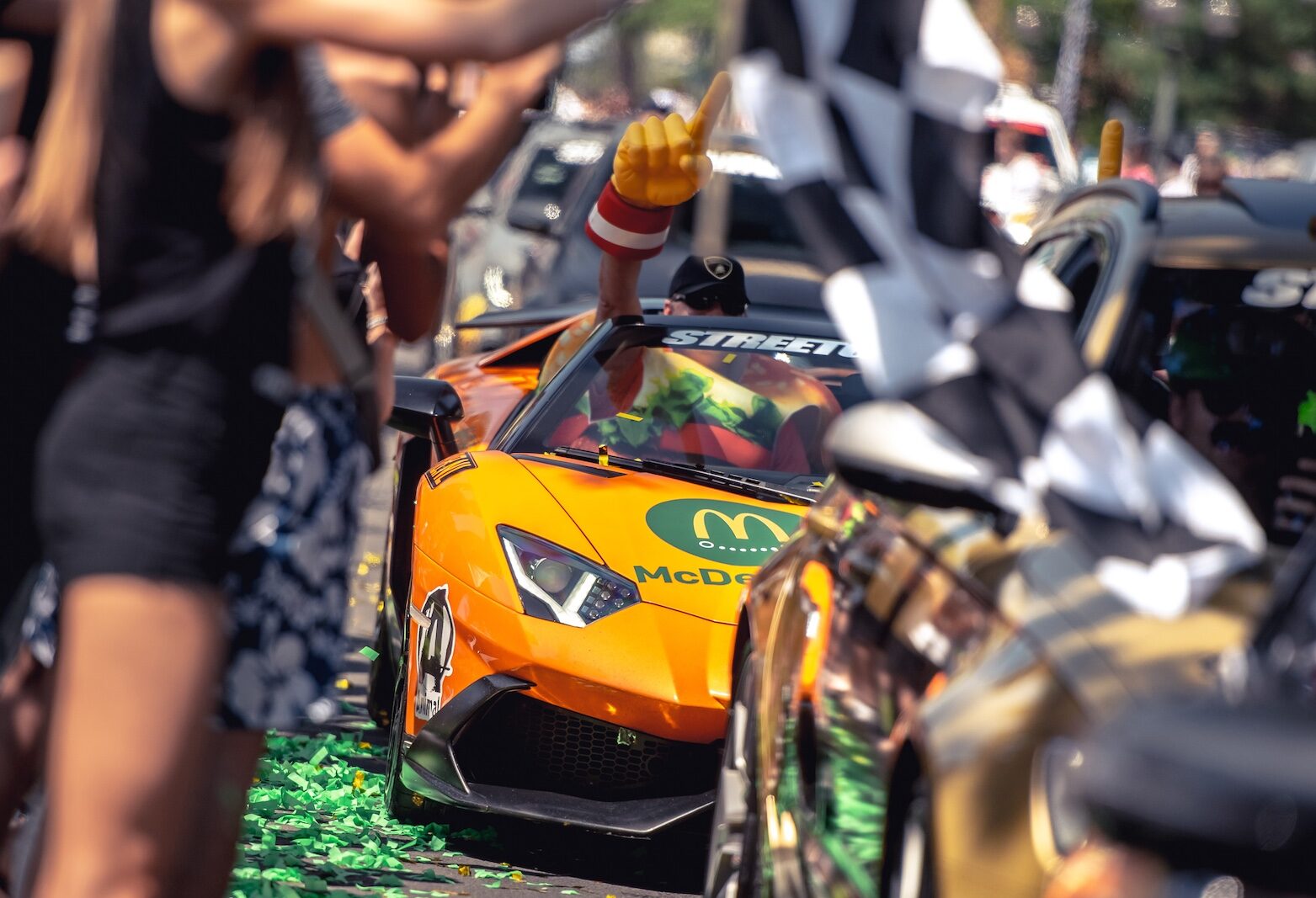 Orange Lamborghini Aventador in the parade